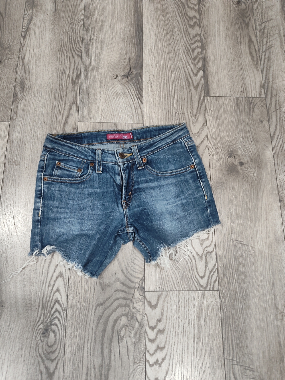 Levi's Medium Blue Frayed Hem Denim Shorts